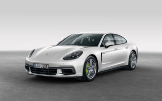 White porsche panamera parking lot - a white wall behind free wallpaper