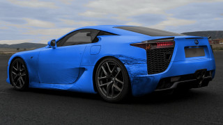 Blue sports car mountains clouds - free cars wallpaper
