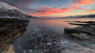 Rocky shore mountains sunset pink - a body of water and mountains free wallpaper