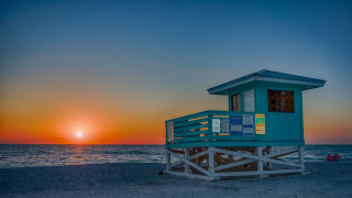 Lifeguard tower beach sunset tilt - the background and a person free wallpaper