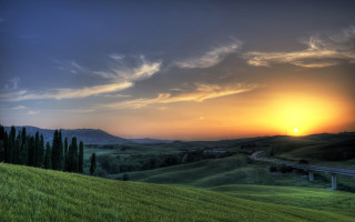 Sunset green field bridge mountain 2 - correggio free wallpaper