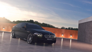 Black car parking lot building 7 - a black car free wallpaper