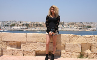 Woman ledge water city stone - photoshoot free wallpaper