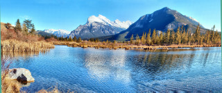 Mountain reflection lake city sky - a mountain range in the background free wallpaper