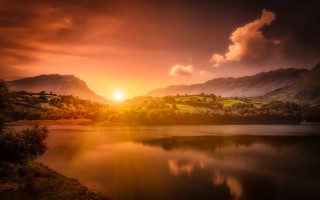 Lake mountain sunset water landscape - a mountain range in the background free wallpaper