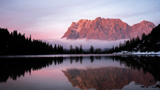 Mountain range reflection sunset forest - a pink sky free wallpaper