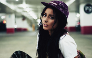 Woman long hair hat skateboard - wall free wallpaper