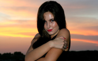 Woman sunset beach clouds horizon - free vintage wallpaper