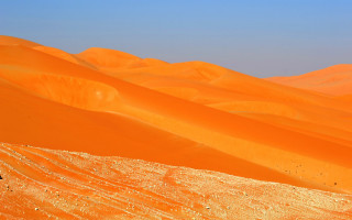 Desert horse rider blue sky 3 - a blue sky above them free wallpaper