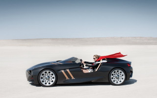 Woman black sportscar red cape - a red cape free wallpaper