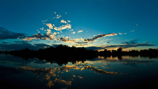 Lake clouds sunset reflection trees - a sky free wallpaper