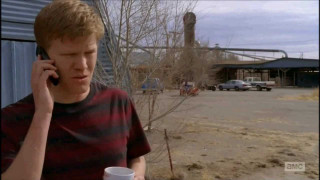 Young man cell phone coffee - his hand and a building in the background free wallpaper