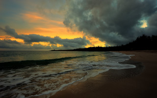 Beach waves sunset clouds person - stormy weather free wallpaper