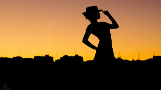 Woman dress hat sunset city - a woman in a dress and hat free wallpaper