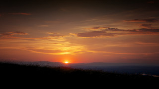 Sunset horse rider mountains cityscape - a horse free wallpaper