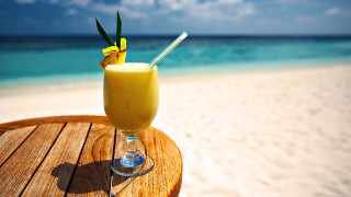 Beach ocean drink sand sky - a drink free wallpaper