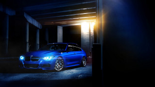 Blue car parking garage headlight - a bright light free wallpaper