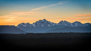 Mountain range sunset clouds trees 7 - a sunset in the background free wallpaper for desktop