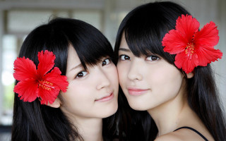 Two women red flowers photorealistic - symmetrical facial feature free wallpaper