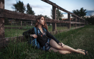 Woman sitting grass fence Eszter - the grass next free wallpaper