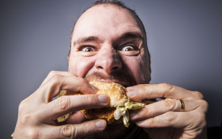 Man eating sandwich wide eyed - wide free wallpaper for desktop