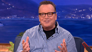 Man sitting chair hands up - christopher rush free wallpaper