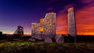Stone tower night redsky cityscape - romanesque free wallpaper