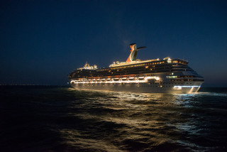 Cruise ship ocean night lights 2 - darrell riche free wallpaper