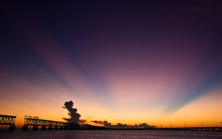 Bridge water sunset sky background - crepuscular ray free wallpaper