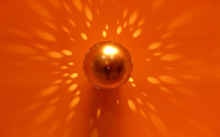 Shiny ball starburst shadow abstract - caustic free wallpaper