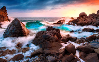 Rocky beach waves sunset cloudy - a blue ocean free wallpaper for desktop