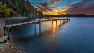 Lake sunset clouds bridge city - a dock free wallpaper