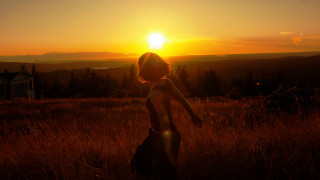 Woman field sunset house backlighting - the sun setting behind her free wallpaper