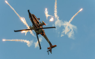 Helicopter fire wings clouds ocean - a helicopter free wallpaper
