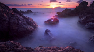 Sunset rocky beach water rocks 2 - a sunset over a rocky beach free wallpaper