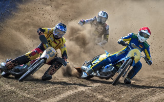 Motorcyclists racing dirt field falling - dirt free wallpaper