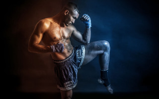 Muscular male boxing glove tattoo - his leg free wallpaper