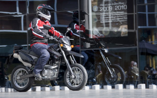 Man riding motorcycle street tall - heidelberg school free wallpaper