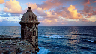 Cliff tower ocean sunset clouds - a tower free wallpaper