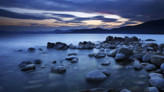 Rocky beach mountains clouds sunset - a rocky beach free wallpaper for desktop