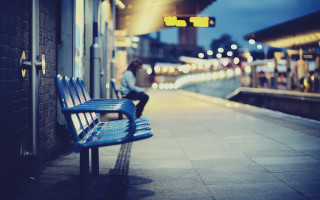 Train station night bench passing - a train station free wallpaper