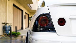 White car street building clock - a white car free wallpaper