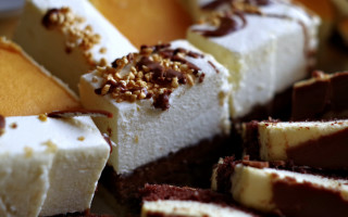 Desserts nuts fork blurry bokeh - a close up of a plate free wallpaper