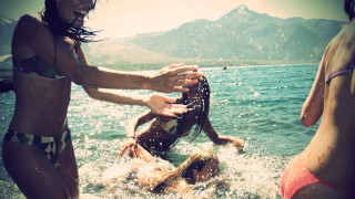 Group of people splashing water - drew tucker free wallpaper