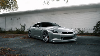 Silver sports car white building - a white building free wallpaper for desktop