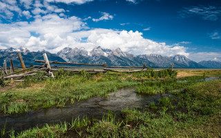 Wooden fence green field river - a river and mountains free wallpaper