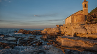 Church rocky shore sunset boat - a church free wallpaper