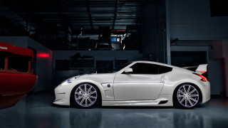 White sports car red garage 2 - a white sports car free wallpaper