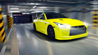 Yellow sports car driving parking - a yellow sports car free wallpaper