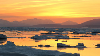 Sunset icebergs mountains water orange - iceberg free wallpaper